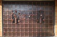 Гаражные ворота с ковкой